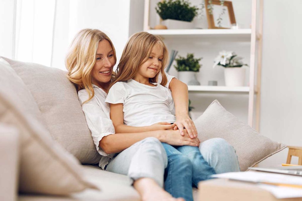 mum with her daughter on the sofa, Becoming a Single Parent